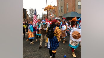 Defiant Mummers strut through South Philly despite parade cancellation