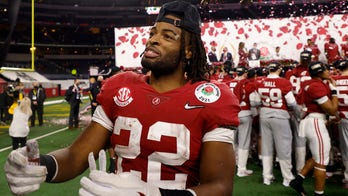 Bama's Waddle back practicing, status for title game unclear