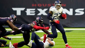 Derrick Henry reaches 2,000-yard rushing mark as Titans take AFC South crown