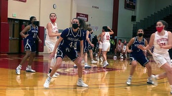 Boston U. men, women wear masks in wins over Holy Cross