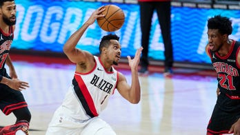 White scores 21 and Bulls rally to beat Blazers 111-108