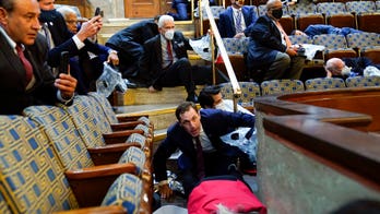 Lawmakers, aides and others sheltering inside Capitol describe chaos; at least 1 dead