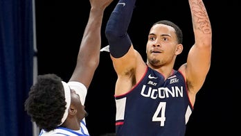 Unexpected win has UConn fans downing hot sauce for charity