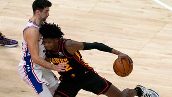 Young's 26 points lead Hawks past short-handed 76ers, 112-94