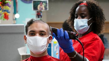 New Army hair and grooming standards allow for ponytails, nail polish, earrings and more