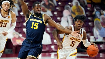 With COVID-19 variant positives, Michigan pauses athletics