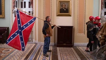 Delaware man with Confederate flag during Capitol riot is arrested