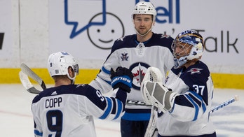 Connor Hellebuyck makes 28 saves, Jets beat Senators 4-1