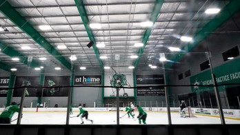 Virus concerns hit Dallas, Columbus as NHL season looms