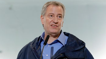 New York City Mayor Bill de Blasio vows to 'redistribute the wealth of this city'