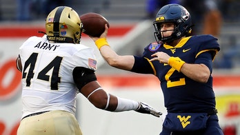 West Virginia rallies to beat Army 24-21 in Liberty Bowl