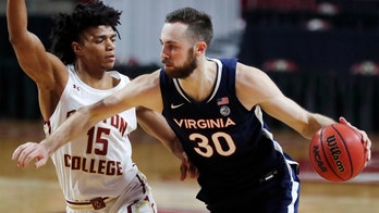 Huff leads No. 22 Virginia past Boston College 61-49