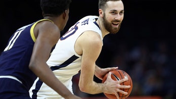 Huff, Hauser lead No. 18 Virginia past Fighting Irish, 80-68