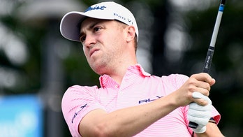 Thomas, English share lead on idyllic start to new year