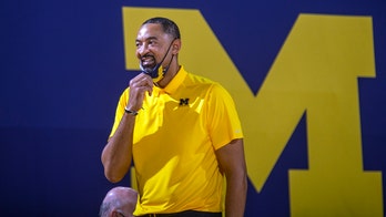 Dickinson-led No. 10 Michigan routs No. 16 Minnesota 82-57