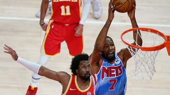 Durant's 32 points lead Nets past Young, Hawks 132-128 in OT