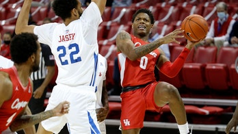 No. 5 Houston rebounds from 1st loss with 74-60 win at SMU