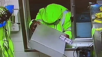 McDonald's drive-thru armed robbery caught on video as Maryland police look to ID suspect