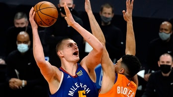Jokic scores 31, Nuggets rally to beat Suns 130-126 in OT