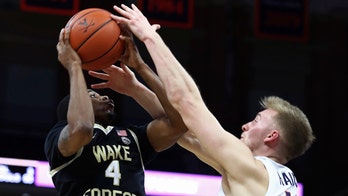 Hauser sparks No. 22 Virginia past Wake Forest, 70-61