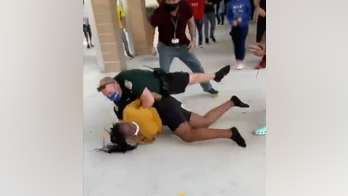 Video shows officer slamming Florida high school student into ground during confrontation
