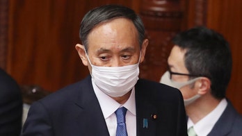 Japan's PM vows Olympics will be proof of victory over virus