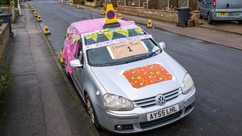 Neighbors throw birthday party for abandoned car that's been left on street for a year