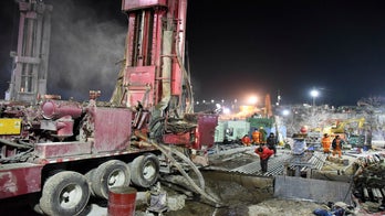 China gold mine explosion: At least a dozen workers still alive after being trapped for a week, reports say