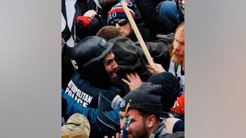 Capitol riot suspect charged with using 'electroshock weapon,' flagpole to assault DC police officer