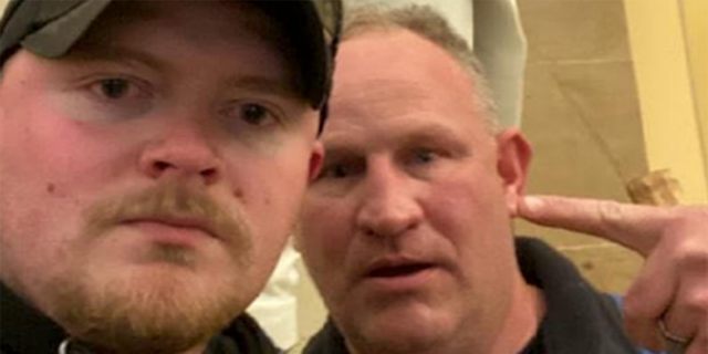 Police officers Jacob Fracker and Thomas Robertson took a selfie inside the U.S. Capitol during an insurgency.  Fracker is a member of the National Guard, the military said on Friday.