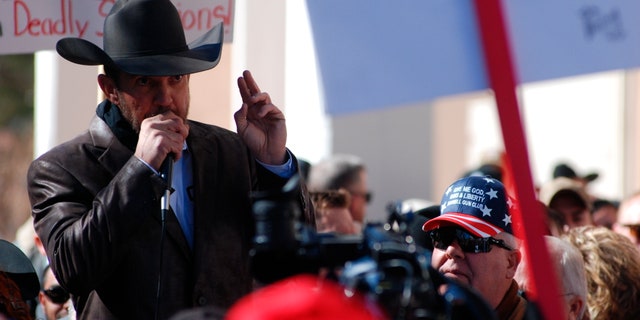 FILE - In this Jan. 31, 2020, file photo, County Commissioner Couy Griffin, a New Mexico county official who runs a group called "Cowboys for Trump," vowed to return to Washington after last week's riot at the U.S. Capitol to place a flag on House Speaker Nancy Pelosi's desk was arrested by the FBI on Sunday, Jan. 17, 2021. Griffin was arrested on charges of illegally entering the U.S. Capitol. (AP Photo/Morgan Lee, File)