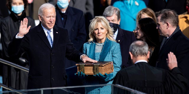 WASHINGTON, Jan. 20, 2021 -- U.S. President-elect Joe Biden (L, front) is sworn in as the 46th President of the United States in Washington, D.C., the United States, on Jan. 20, 2021. (Photo by Liu Jie/Xinhua via Getty) (Xinhua/Liu Jie via Getty Images)