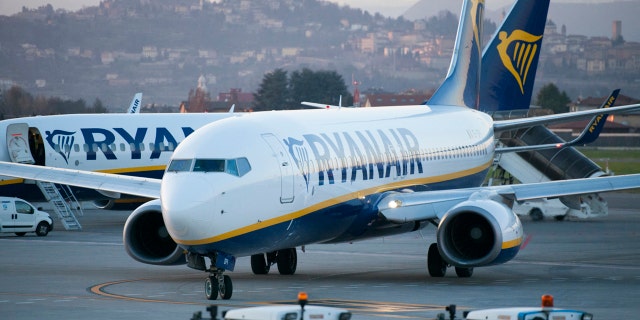 Bergamo, Italy - March 18, 2016: Ryanair B737 taxiing to depart at Bergamo-Orio al Serio International Airport. A Ryanair flight from Dublin, Ireland to Krakow, Poland Sunday was diverted to Berlin, Germany due to a "potential security threat on board." Ryanair is the largest low-cost European airline by scheduled passengers carried.