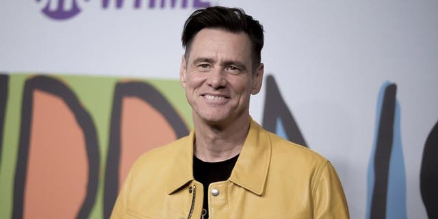 In recent weeks, actor and comedian Jim Carrey has shared political cartoons on Twitter.  (Richard Shotwell / Invision / AP)