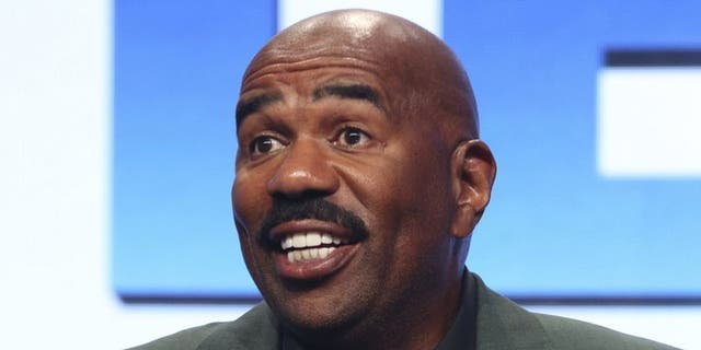 Comedian Steve Harvey joked that he had a reserve of hate reserved for his stepdaughter's partners.  (Willy Sanjuan / Invision / AP)