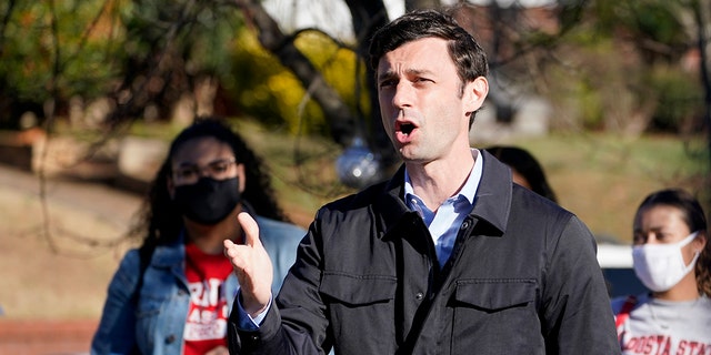 Democratic nominee for U.S. Senate from Georgia Jon Ossoff speaks after voting early in Atlanta on Tuesday, Dec. 22, 2020. For the second time in three years, Ossoff is campaigning in overtime. The question is whether the 33-year-old Democrat can deliver a win in a crucial Jan. 5 runoff with Republican Sen. David Perdue. (AP Photo/John Bazemore)