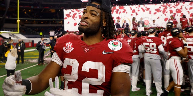 Alabama running back Najee Harris celebrates after their win against Notre Dame in the Rose Bowl NCAA college football game in Arlington, Texas, Friday, Jan. 1, 2021. (AP Photo/Michael Ainsworth)
