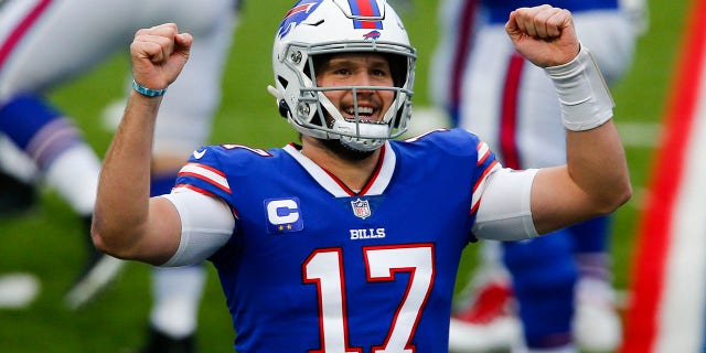 Buffalo Bills quarterback Josh Allen (17) reacts after throwing a touchdown pass in the first half of an NFL football game against the Miami Dolphins, Sunday, Jan. 3, 2021, in Orchard Park, N.Y. (AP Photo/John Munson)