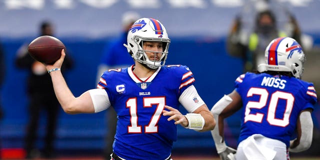 Buffalo Bills quarterback Josh Allen passes in the first half of an NFL football game against the Miami Dolphins, Jan. 3, in Orchard Park, N.Y. (AP Photo/Adrian Kraus)