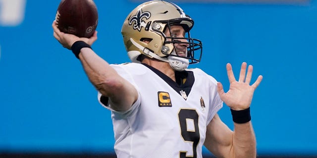 New Orleans Saints quarterback Drew Brees passes against the Carolina Panthers during the first half of a game Jan. 3, 2021, in Charlotte, N.C.