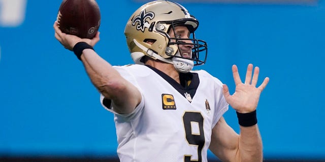 New Orleans Saints quarterback Drew Brees passes against the Carolina Panthers during the first half of a game Jan. 3, 2021, in Charlotte, N.C. 