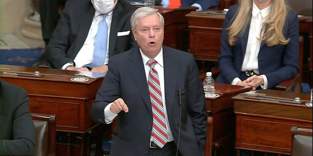 In this image from video, Sen. Lindsey Graham, R-S.C., speaks as the Senate reconvenes to debate the objection to confirm the Electoral College Vote from Arizona, after protesters stormed into the U.S. Capitol on Wednesday, Jan. 6, 2021. (Senate Television via AP)