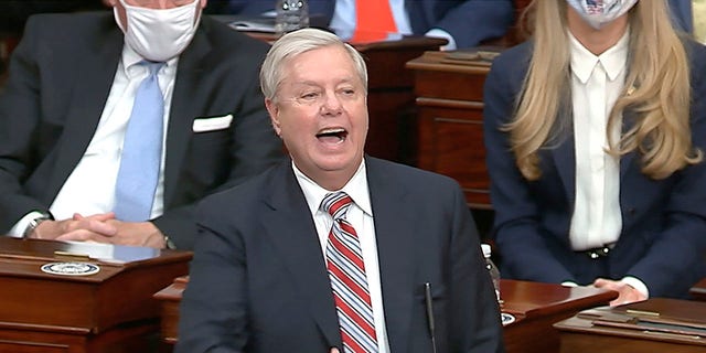 In this image from the video, Senator Lindsey Graham, RS.C., speaks as the Senate reconvenes to debate the objection to uphold the Arizona Electoral College vote, after Protesters burst into the U.S. Capitol on Wednesday, January 6, 2021. (Senate TV via AP)