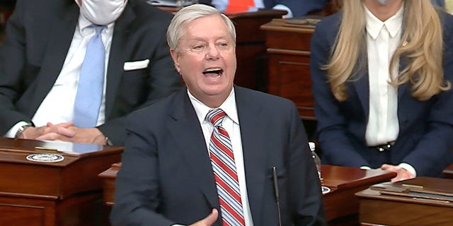 In this image from the video, Senator Lindsey Graham, RS.C., speaks as the Senate reconvenes to debate the objection to uphold the Arizona Electoral College vote, after Protesters burst into the U.S. Capitol on Wednesday, January 6, 2021. (Senate TV via AP)