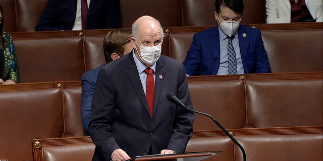 In this image from video, Rep. Tom O'Halleran, D-Ariz., speaks as the House reconvenes to debate the objection to confirm the Electoral College vote from Arizona, after protesters stormed into the U.S. Capitol on Wednesday, Jan. 6, 2021. (House Television via AP)