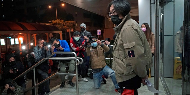 Mike Lam King-nam, who participated in the pro-democracy primary elections, leaves police station after being bailed out in Hong Kong, Thursday, Jan. 7, 2021. (AP Photo/Kin Cheung)