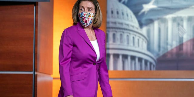 Speaker of the House Nancy Pelosi, D-Calif., holds a news conference on the day after violent protesters loyal to President Donald Trump stormed the U.S. Congress, at the Capitol in Washington, Thursday, Jan. 7, 2021. (AP Photo/J. Scott Applewhite)