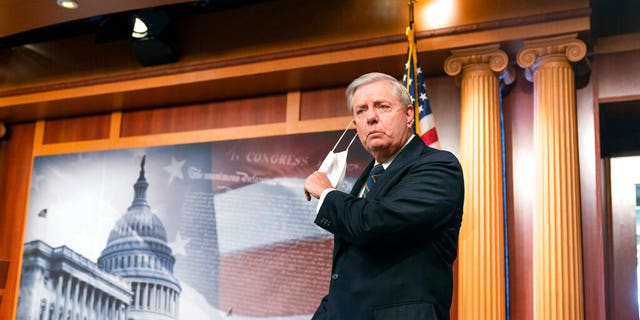 Senator Lindsey Graham, RS.C., speaks to reporters during a press conference on Capitol Hill, Thursday, January 7, 2021, in Washington.  Graham said Thursday that the president must accept his own role in the violence at the United States Capitol.  (AP Photo / Manuel Balce Ceneta)