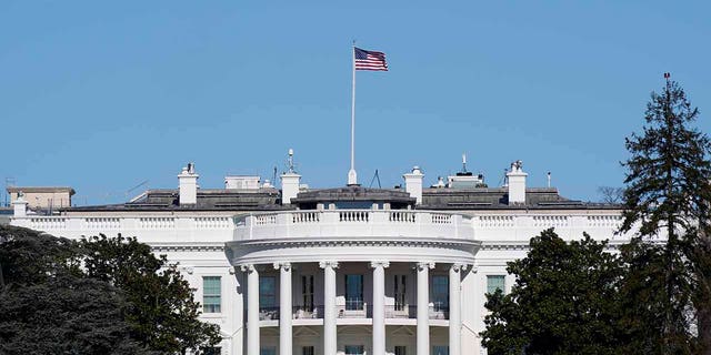 An American flag flies above the White House in Washington, Jan. 9. (AP Photo/Patrick Semansky)