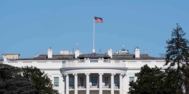 An American flag flies above the White House in Washington, Jan. 9. (AP Photo/Patrick Semansky)